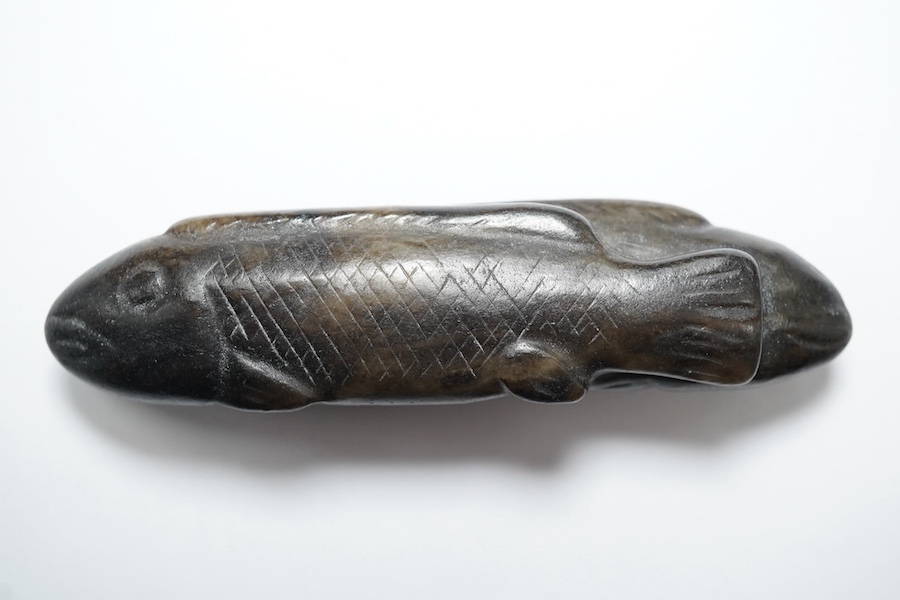 A Chinese black and white jade 'fish' sword fitting, Song or later